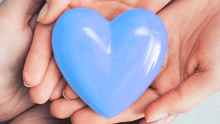 hands holding blue heart